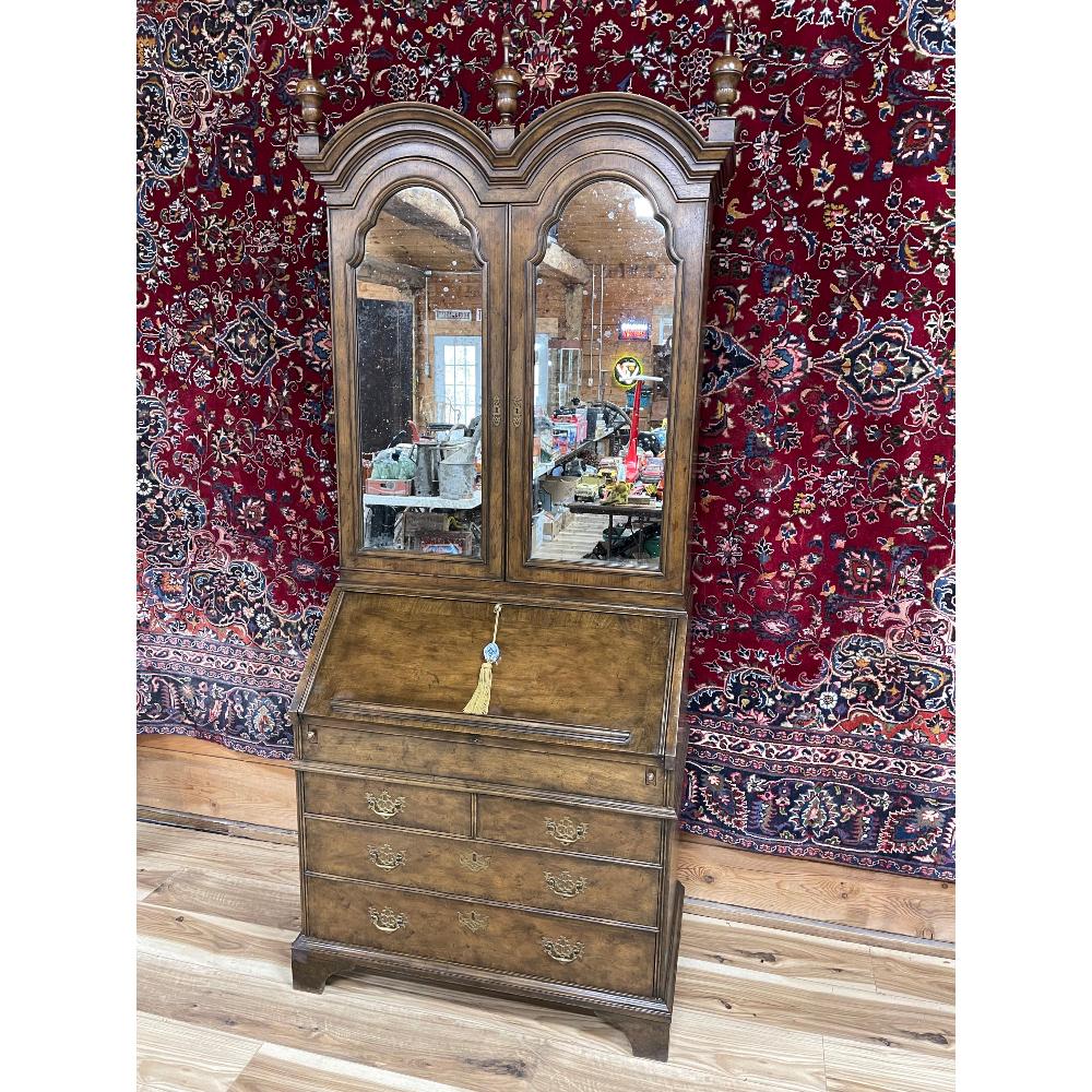Vintage Baker Burl Walnut Drop Front Secretary Desk: Burled walnut. Very heavy, solid and well made. Double arched top with mirrored door and finials. Leather drop frontdesk, has key. Vg estate found cond., 90in T x 36in W x 19.5in D.