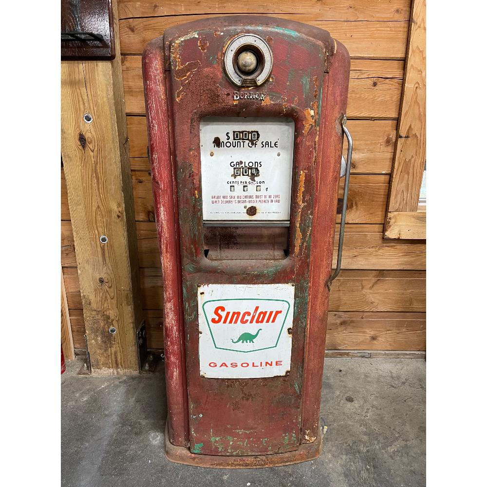 Bennett Sinclair Gas Pump: Barn find, model 66. Has original Sinclair porcelain signs. Solid pump, does have some dings. Missing ad glass and one faceplate. Perfect for restoration. Found condition. 58in T x 25in W x 19in D