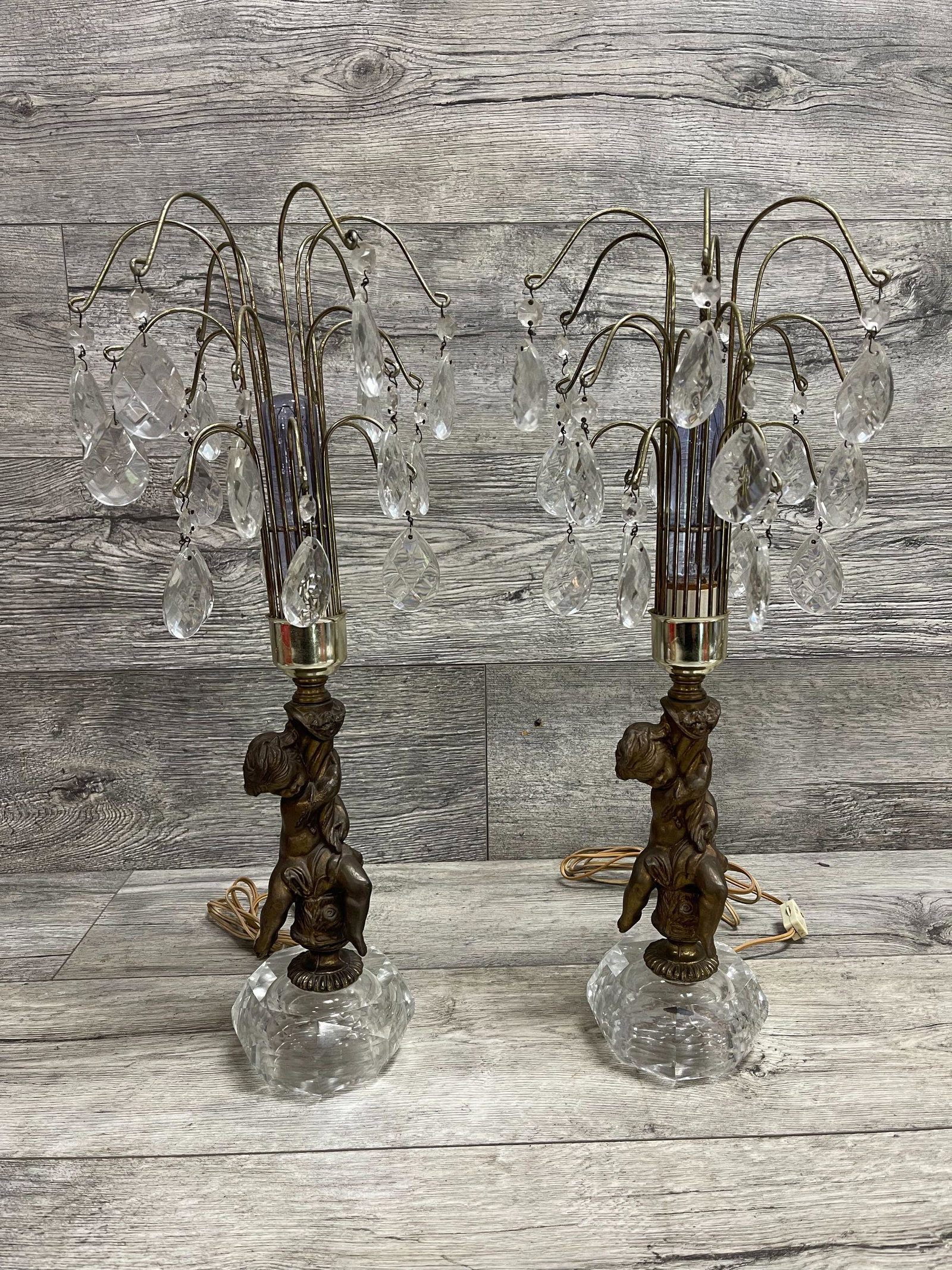 PAIR OF BRONZE CHERUB LAMPS WITH PRISMS: CRYSTAL BASES. 20 1/2 T