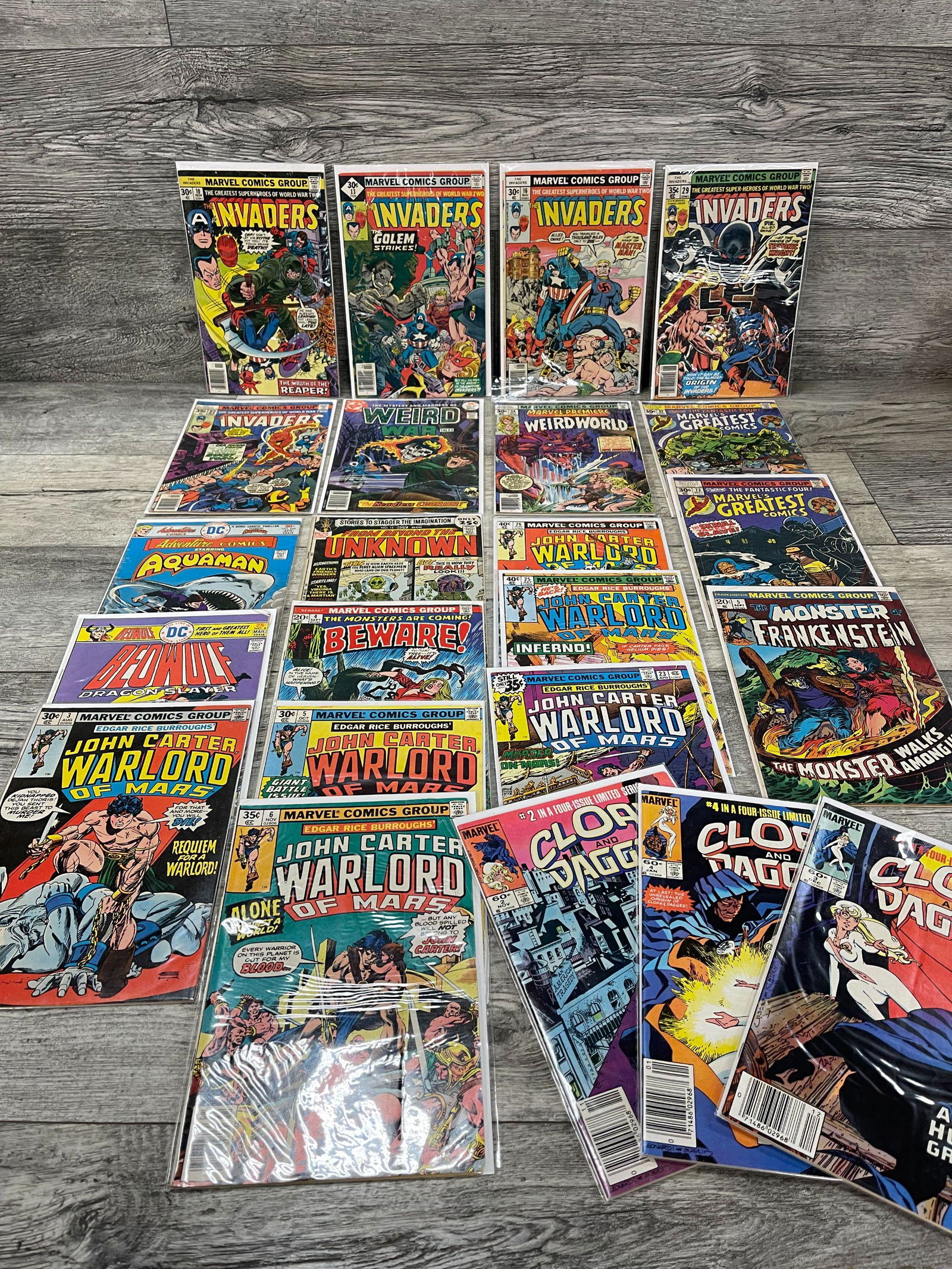 LOT OF 23 MARVEL AND DC COMICS: INVADERS, FRANKENSTEIN, ETC