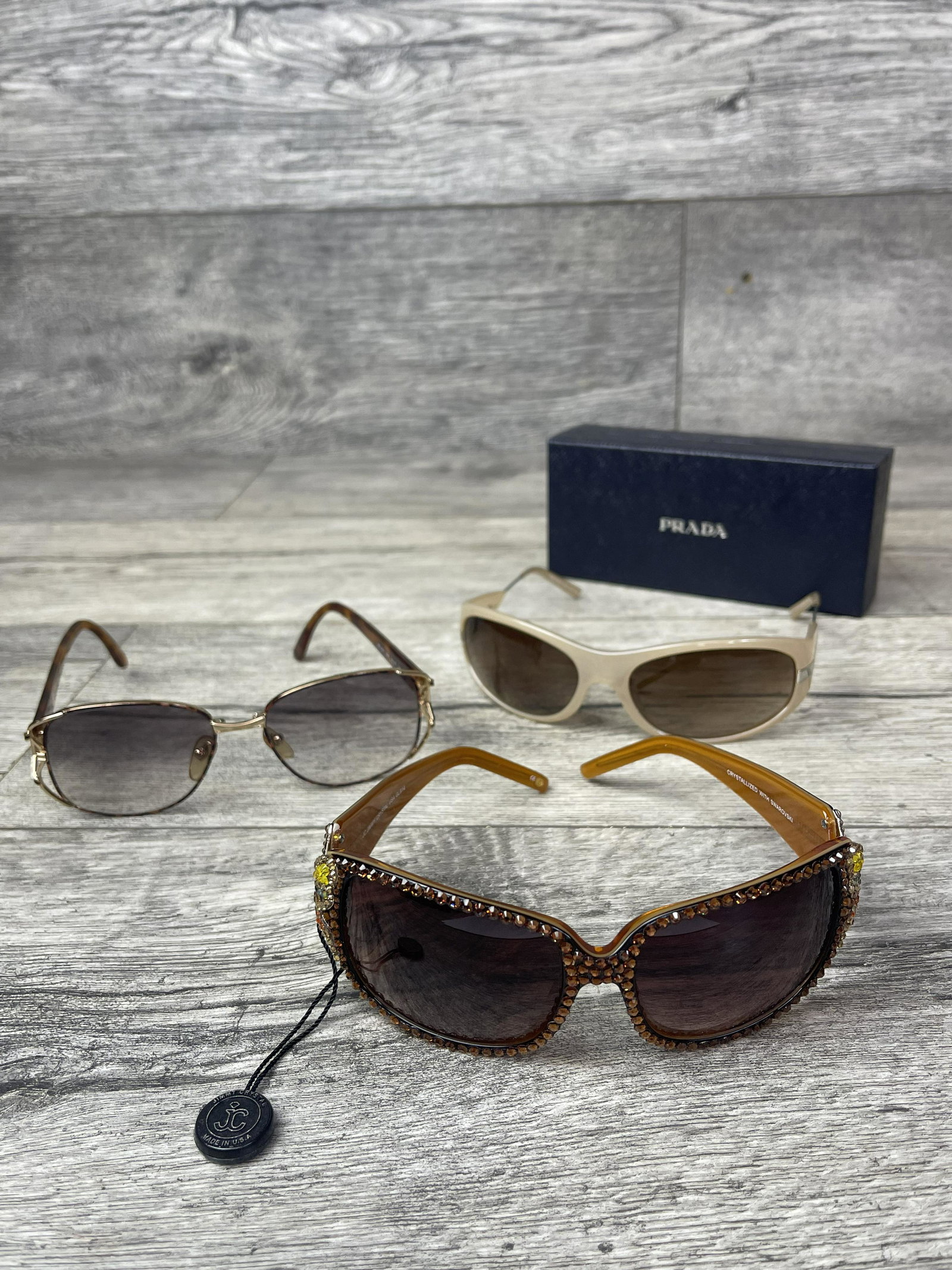3 PAIRS OF WOMENS SUNGLASSES: VERSACE HIGH END, 2 PRADA HIGH END, JIMMY CRYSTAL.