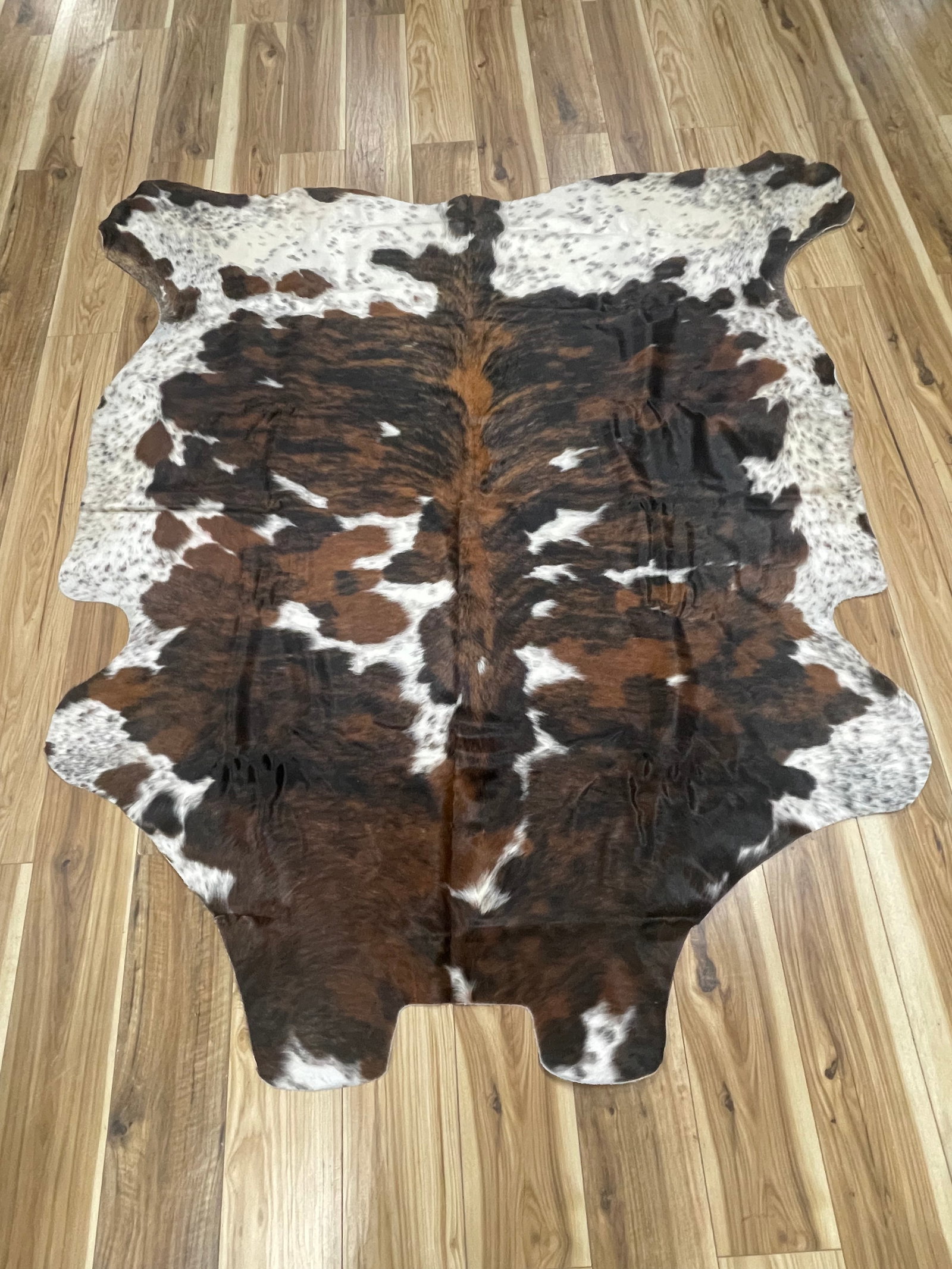 COWHIDE RUG/WALL HANGING: BRINDLE COWHIDE - VGC. GENUINE COWHIDE RUG. 89"L X 80"W