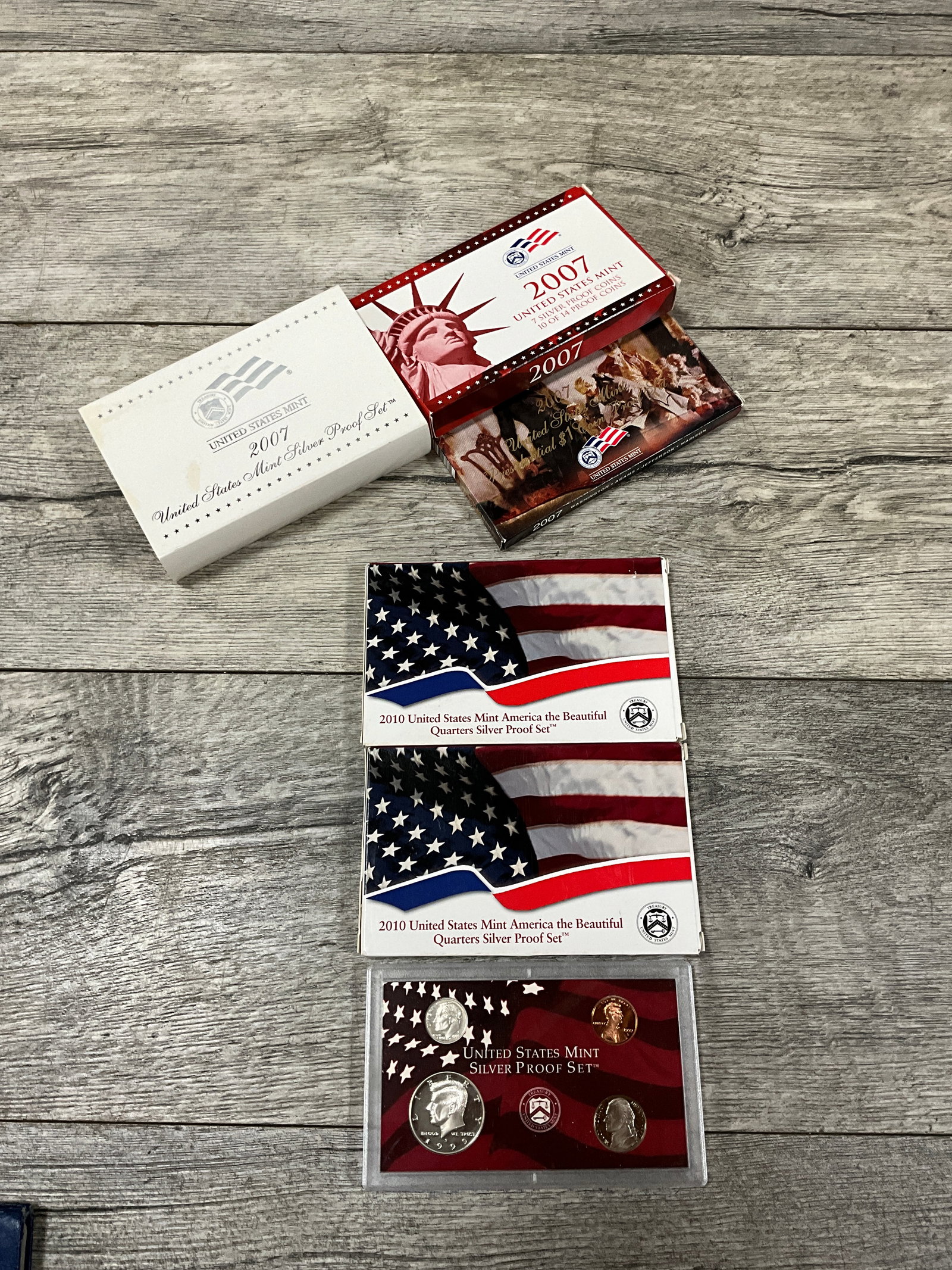 LOT OF U.S. MINT PROOF SETS: 2007, 2 - 2010, 1999. MISSING BOX