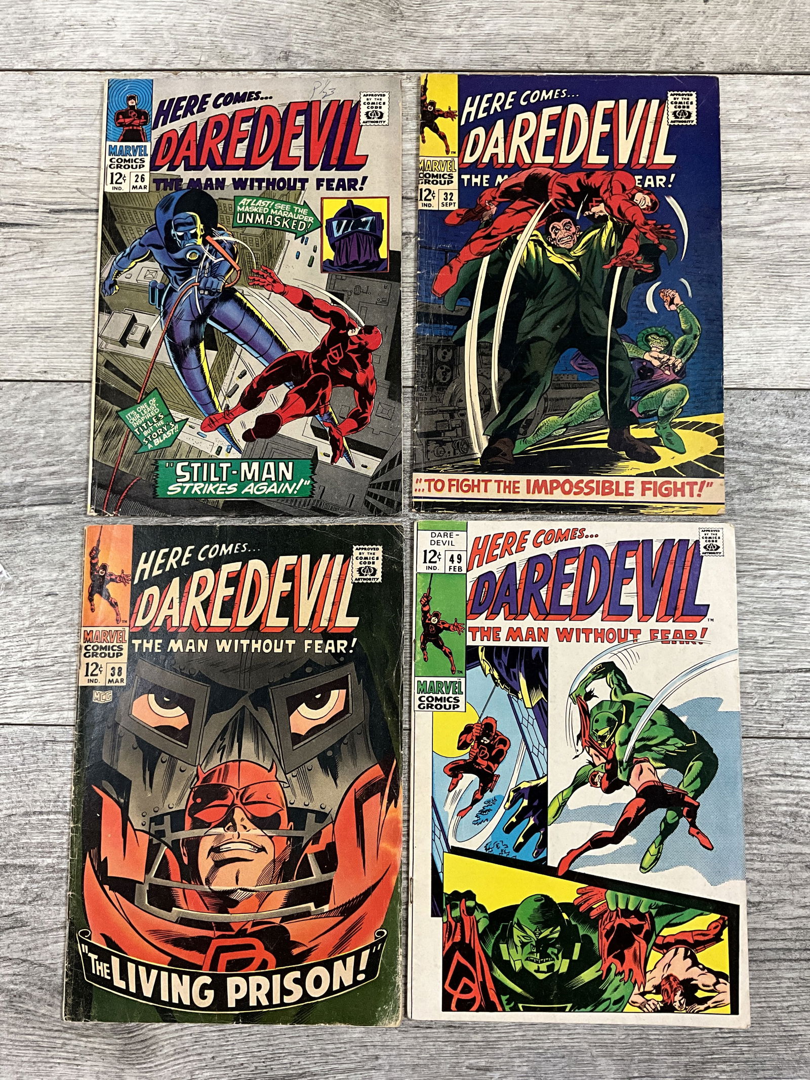 Four issues of Here Comes DareDevil, #'s 26, 32, 38, and 49.  Marvel Comics (1 of 2)