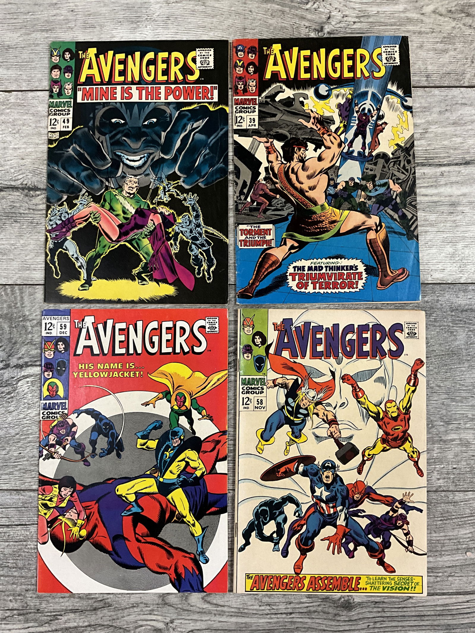 Four issues of The Avengers, #'s 39, 49, 59, and 58.  Marvel comics (1 of 2)