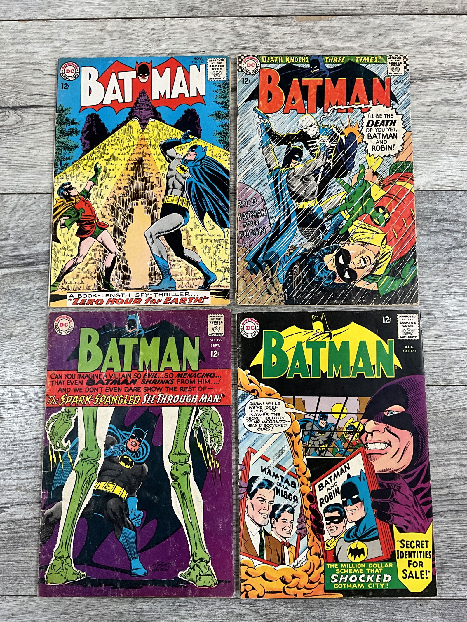 Four issues of Batman, #'s 173, 195, 180, and 167.  DC comics (1 of 2)
