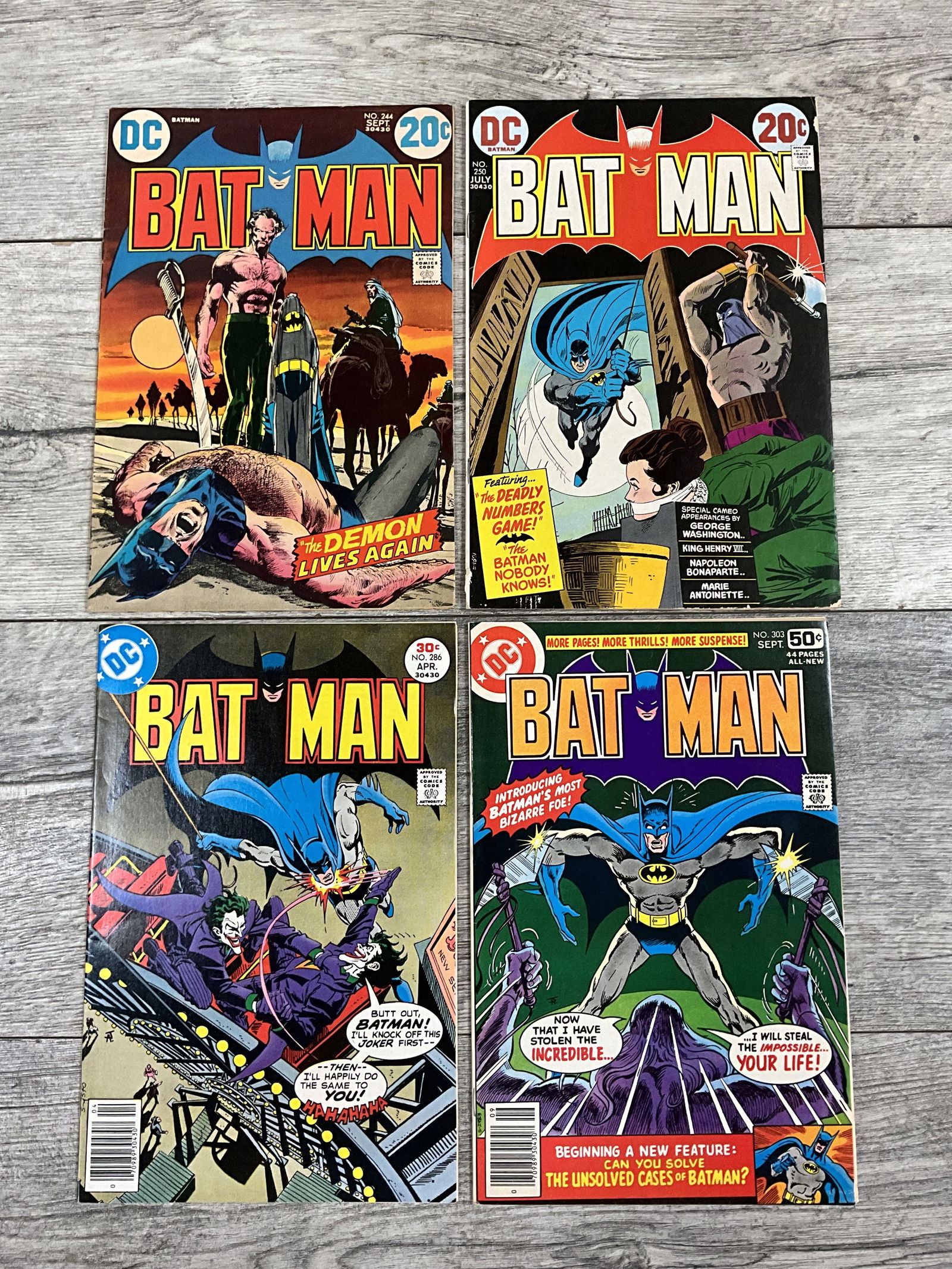 Four issues of Batman #'s 250, 244, 303, 286.  DC comics (1 of 2)