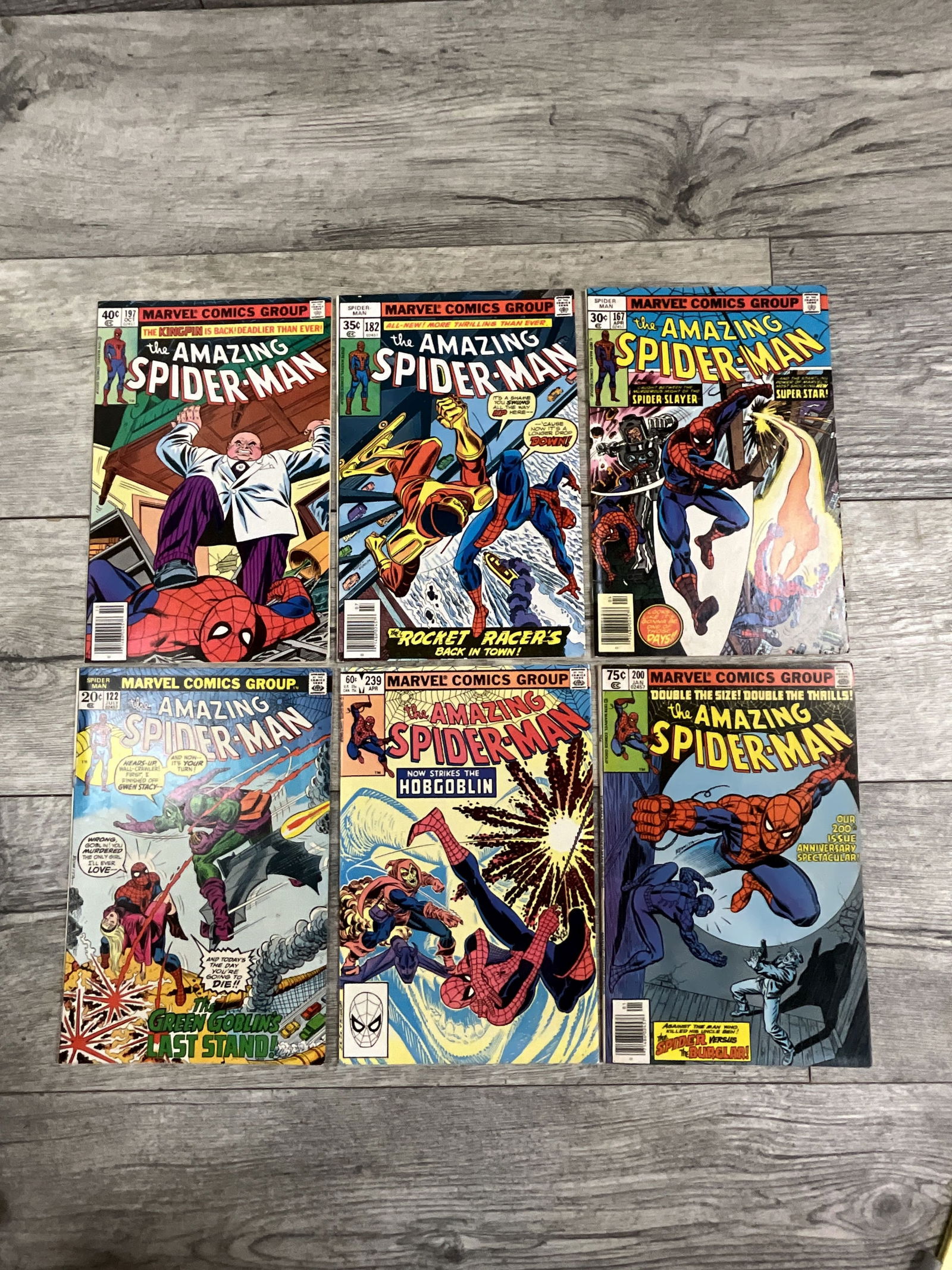 Six issues of the Amazing Spider-man, #'s 200, 182, 167, 122, 239, and 197. (1 of 4)