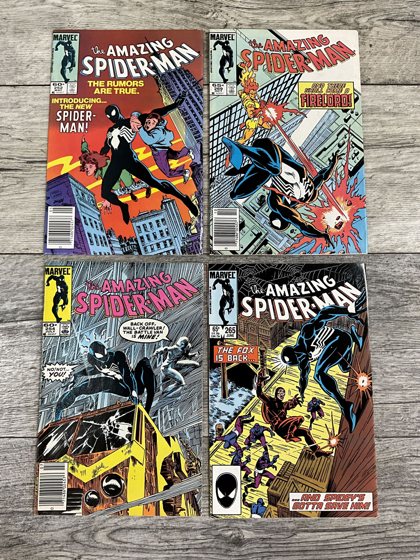 Four issues of The Amazing Spider-man, #'s 252, 269, 254, and 265.  Marvel comics (1 of 2)