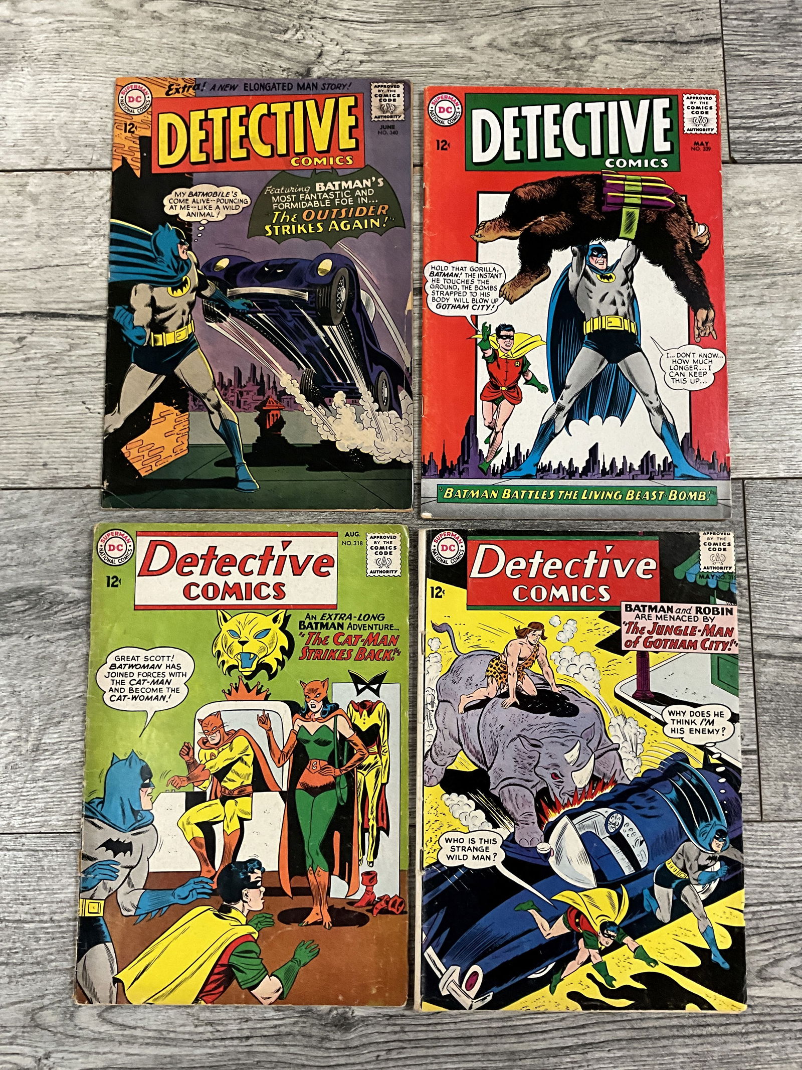 Four issues of Detective Comics, #'s 315, 318, 339, and 340.  Twelve cent  DC comics (1 of 2)