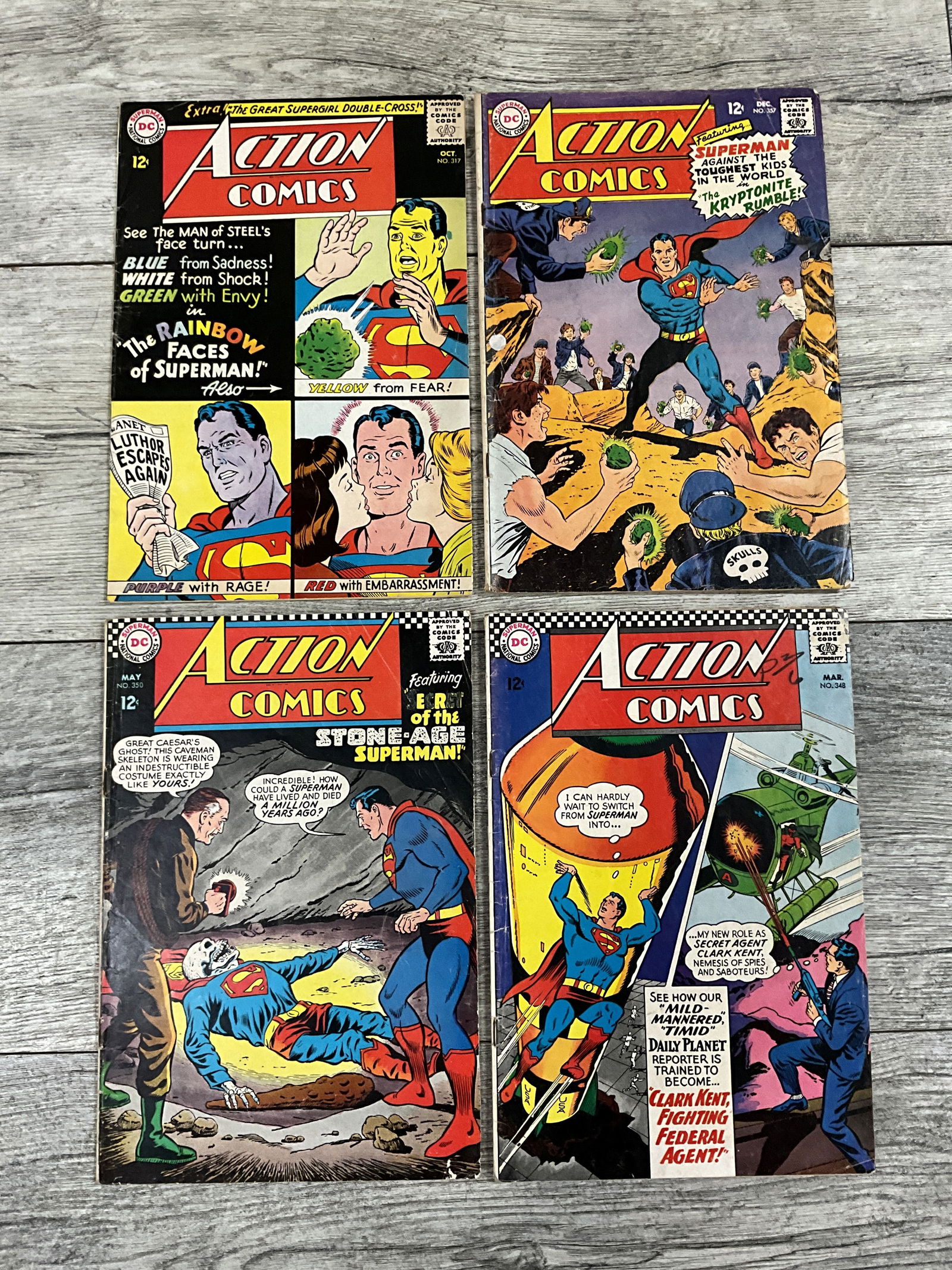 Four issues of Action Comics, #'s 317, 348, 350, and 357.  Twelve cent DC comics (1 of 2)