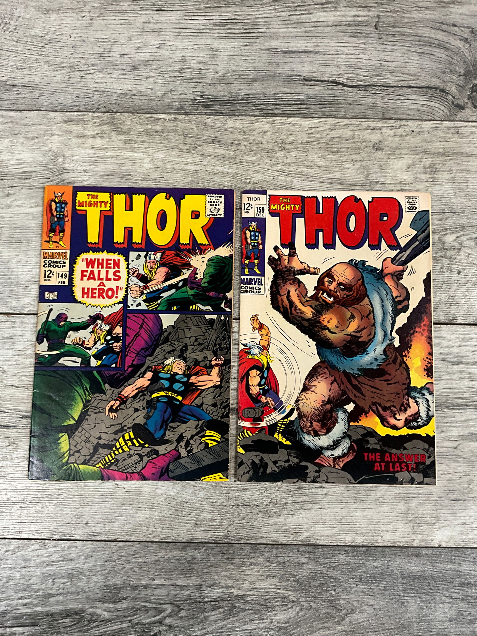 Two issues of The Mighty Thor, #'s 149 and 159.  Twelve cent Marvel comics (1 of 2)