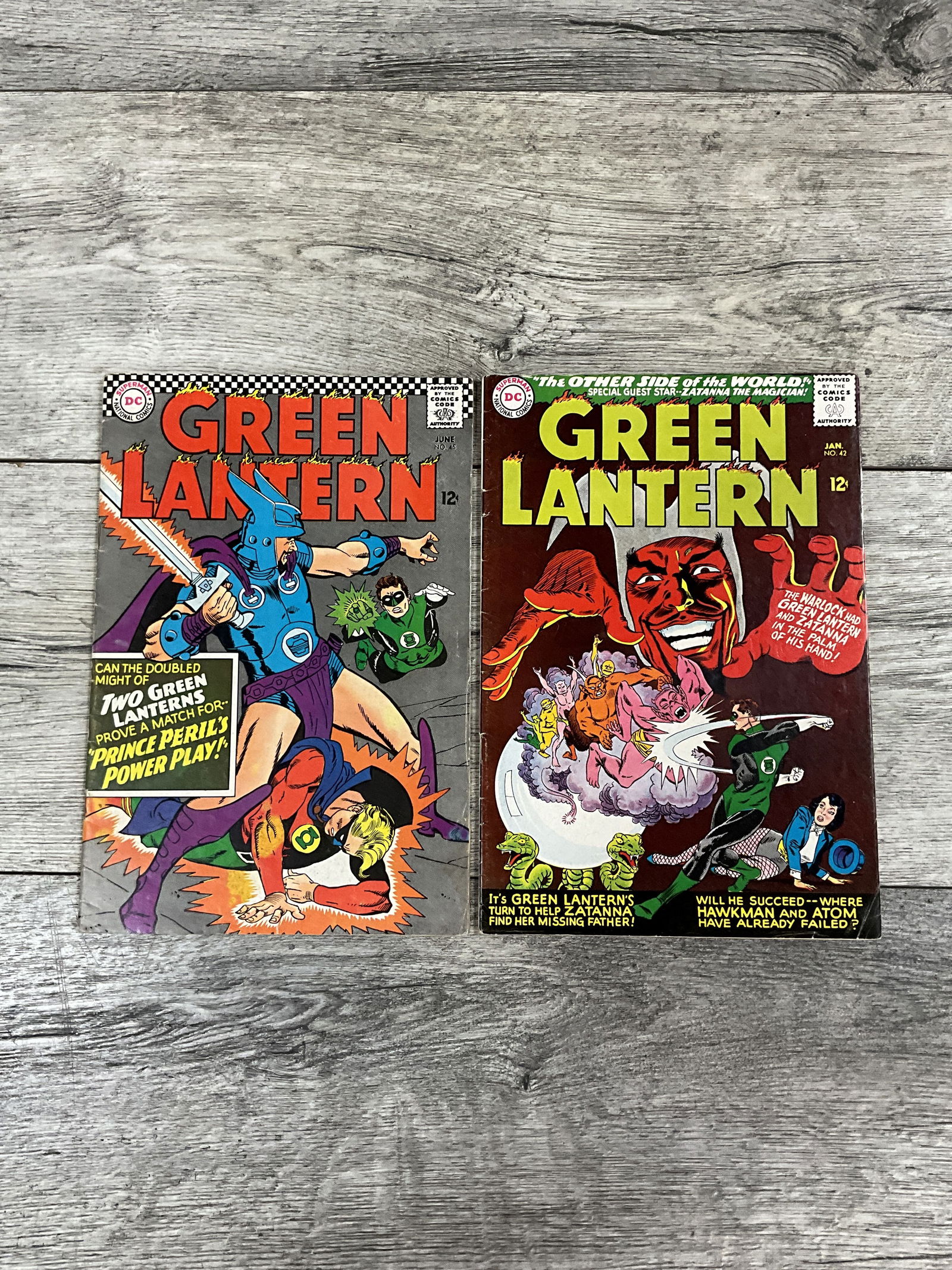 Two issues of The Green Lantern, #'s 42 and 45.  Twelve cent comics.  DC omics (1 of 2)