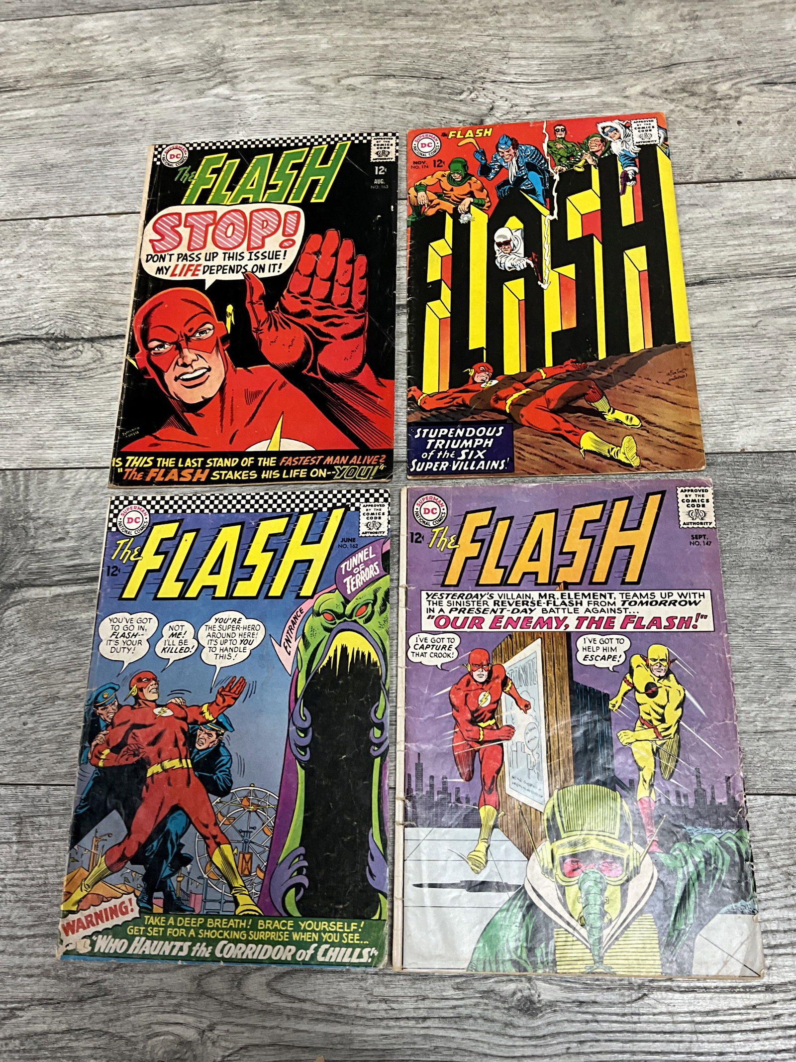 4 issues of the flash #'s 163, 174, 162, 147.  Dc comics (1 of 2)