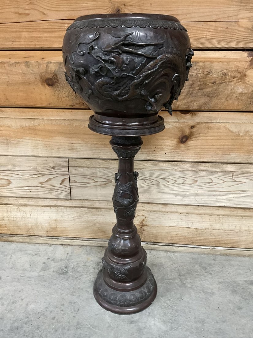Large Asian Bronze Jardiniere Planter and Pedestal Stand: Large dragon, foo dog, and bird carvings. Beautiful. 47" T. Planter is 17" in diameter.