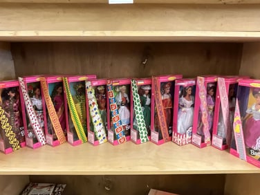 Lot of Twelve Native Costume Barbie Dolls