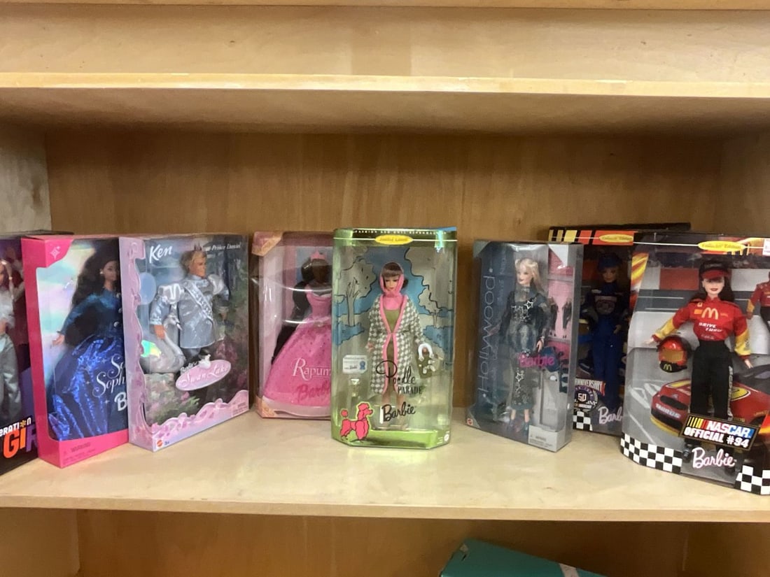 Lot of Eight Barbies: Poodle Parade, Nascar, Generation Girl, Rapunzel, Swan Lake Ken and more