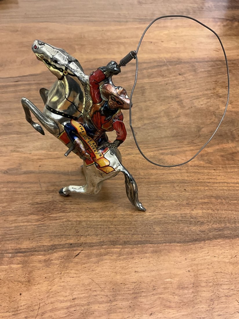 RARE! Lone Ranger High-Yo Silver Wind Up 1938 Marx: RARE metallic silver with red and blue outfit! Perfect working order in very good condition.
