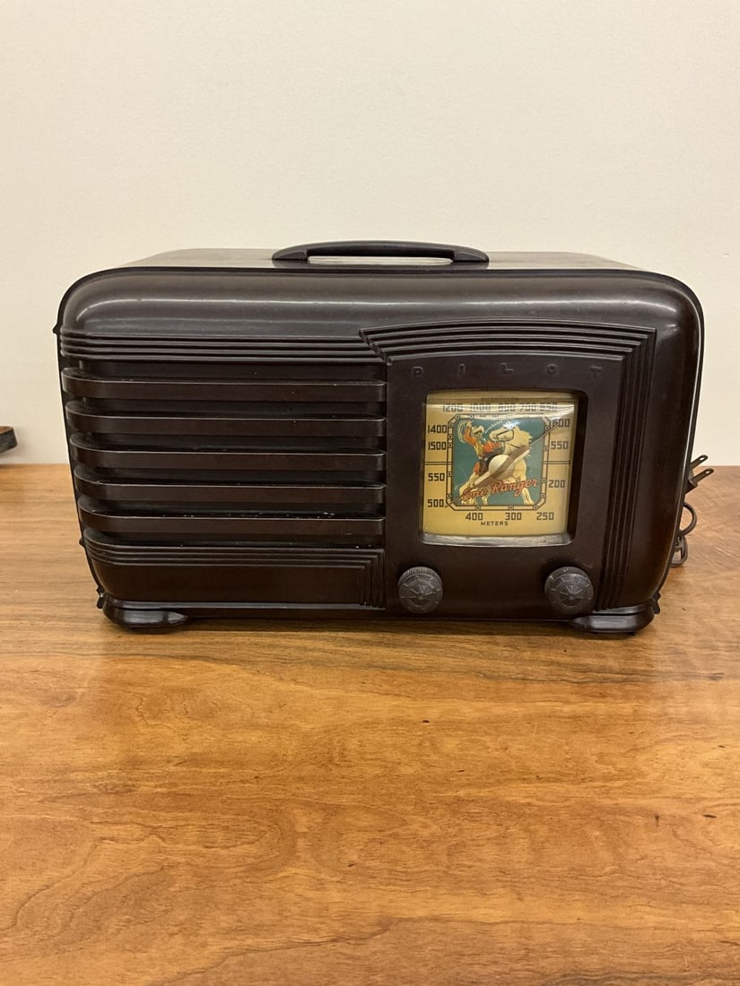 RARE! 1940's Pilot Lone Ranger Bakelite Radio: 5 tube working "Lone Ranger" radio. Celluloid dial cover is cracked but is intact. 6.75" x 14.5" x 8.75" tall
