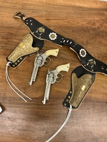 RARE! Pair of 1950's Gene Autry Cap Pistols With Gold Washed Holsters And Belt