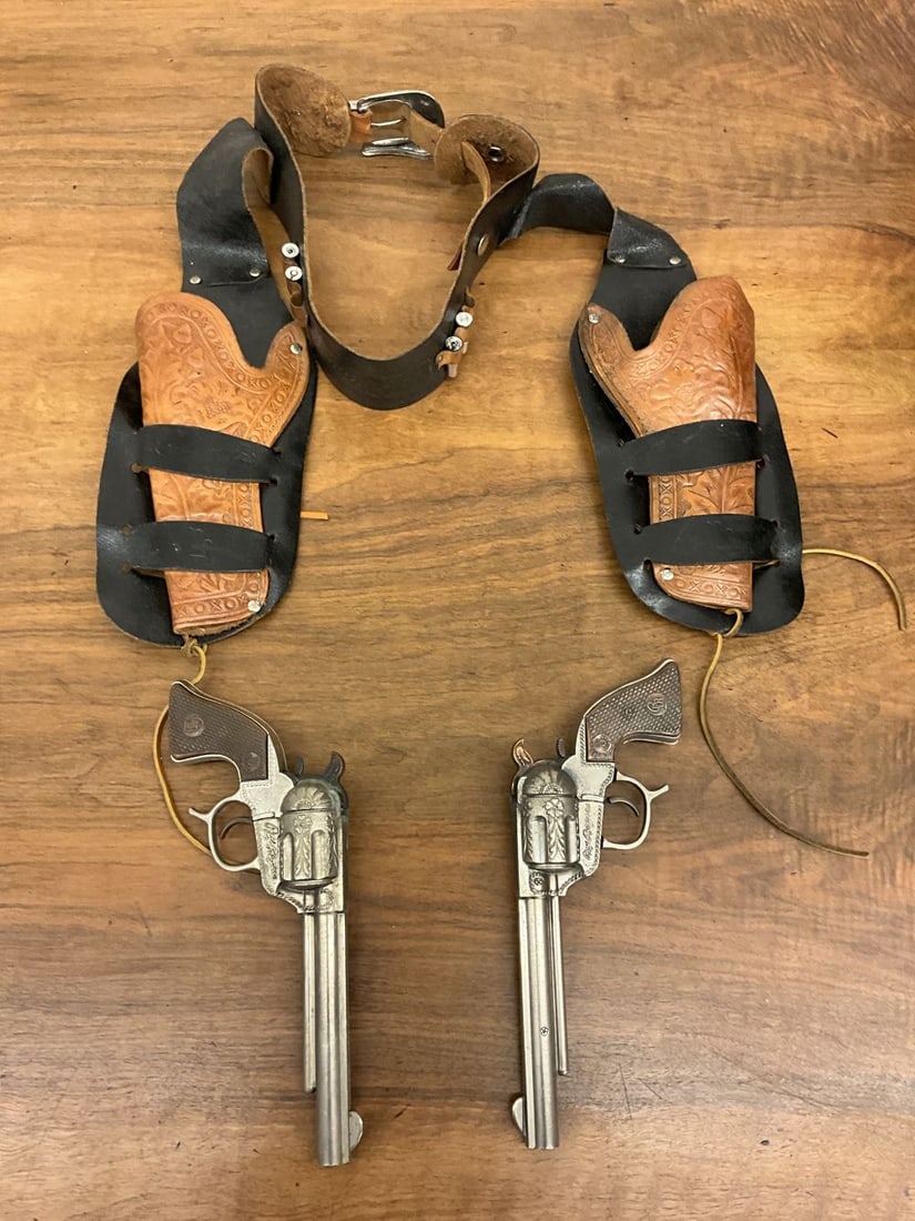 Vintage G. Schmidt Roy Rogers and Silver Cap Guns and Holster: 1950 cap guns- no orange tips. Embossed leather holsters. Action working