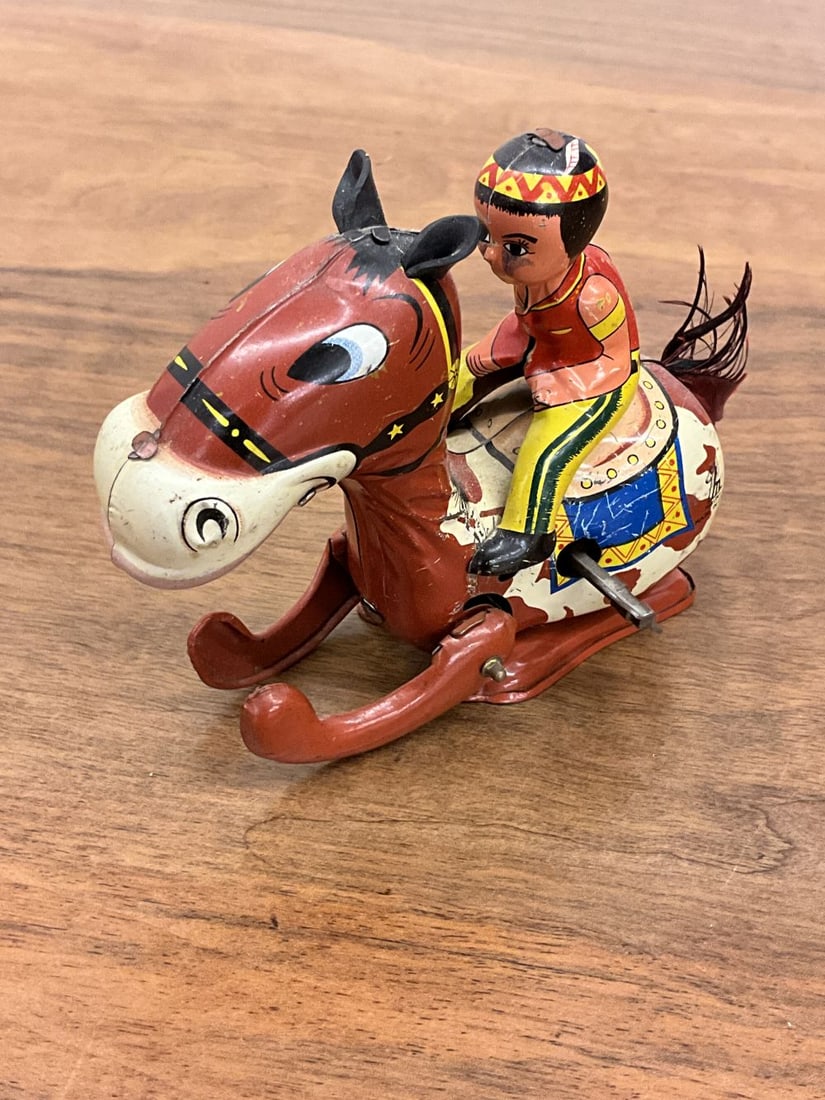 Vintage Mikuni Brave Eagle Wind-up Tin Toy: Working order, has directions for use