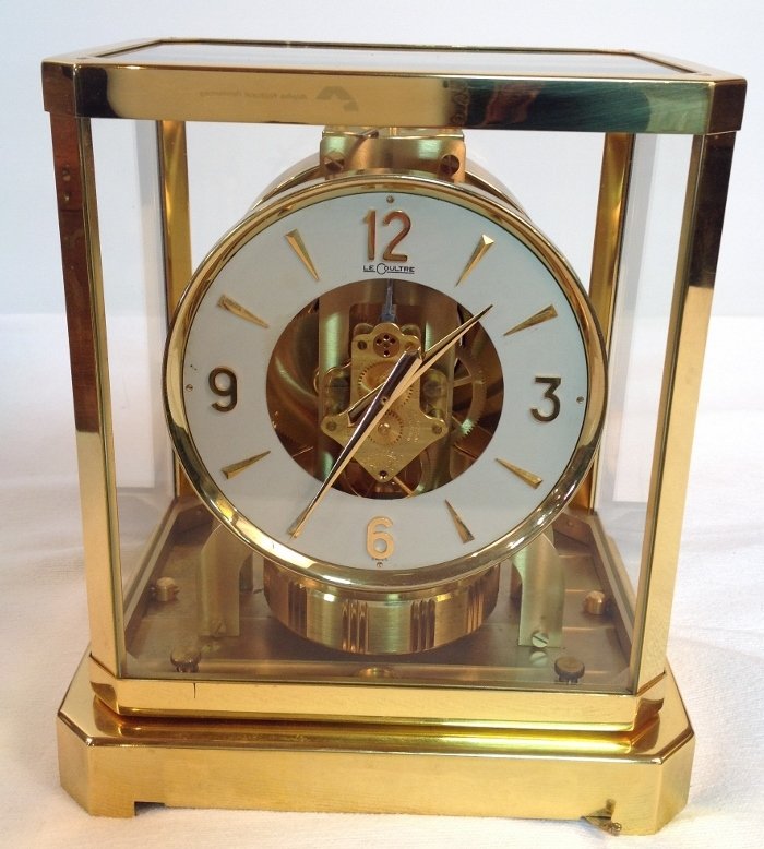 LeCoultre Atmos Clock - Serial # 171454: LeCoultre Atmos Clock - Serial #171454. Plated 24 Karat Gold & Glass Case and 15 Jewel. Measurements: Approximately 9 1/4" Tall x 7 1/2"Wide x 5 1/2" Deep.