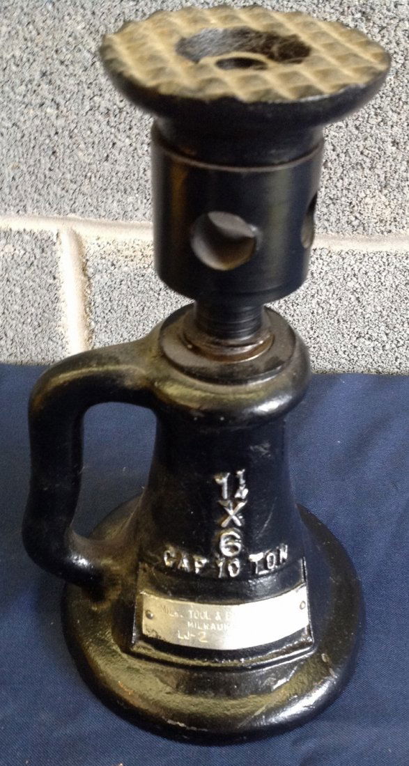 Milwaukee Tool & Equipment Rail Road Jack: Milwaukee Tool & Equipment Rail Road Jack. 1 ¼ x 6 10 Ton CAP. Jack is in Working Condition.10” Tall x 5 3/4” Diameter Base