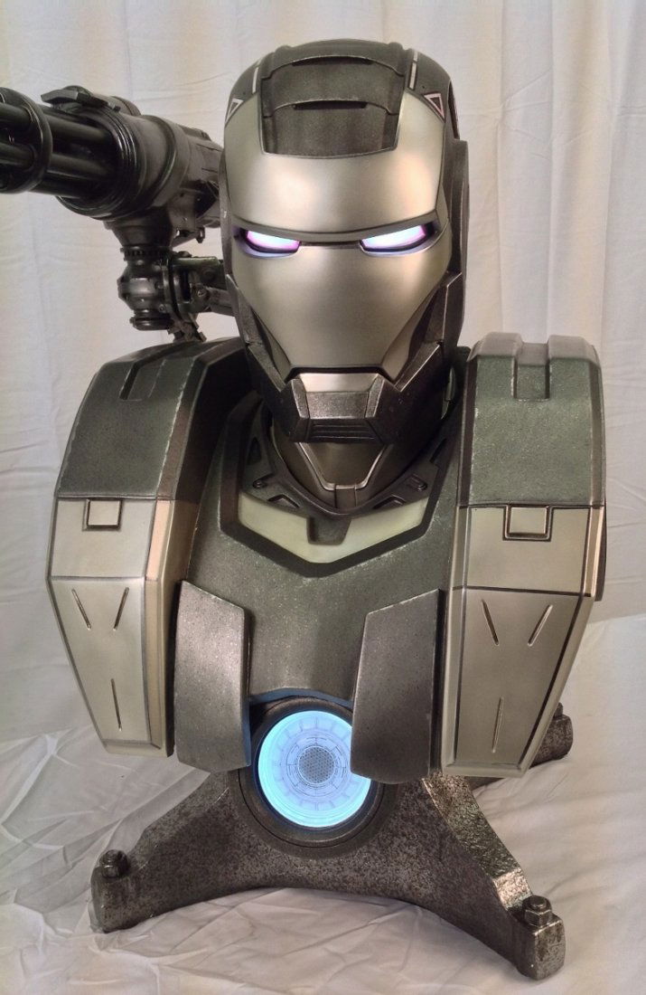 War Machine Life Size Bust by Sideshow Collectibles: LED light-up eyes and arc reactor add incredible realism, and the shoulder-mounted gun swivels for customizable display.
