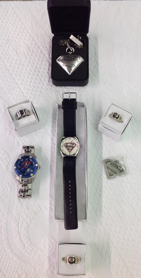 Lot of 7 Superman Jewelry: 1 Necklace, 3 Rings, 3 Watches