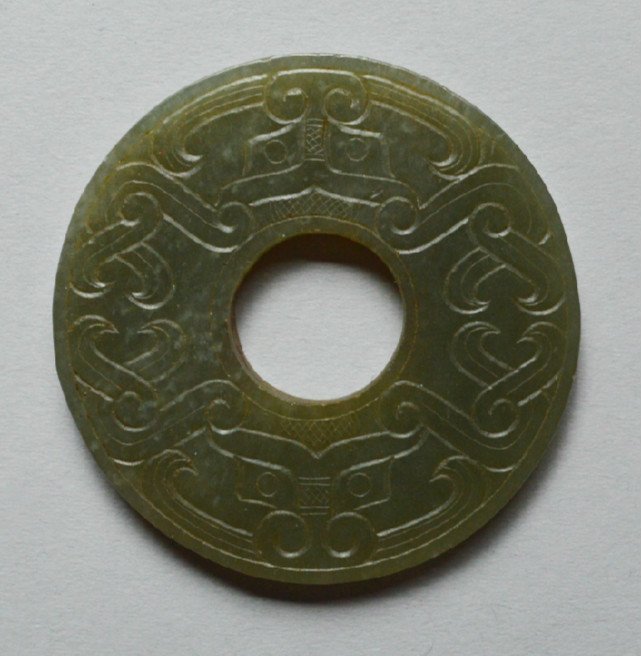 A Tang Ming Dynasty Green Jade Bi (1 of 2)