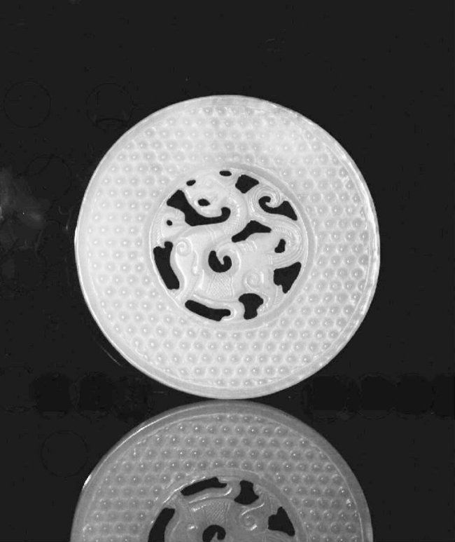 A Ming Dynasty White Jade Bi and Dragon (1 of 2)