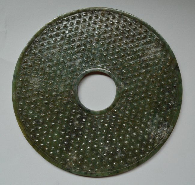 A Large Qing Dynasty Spinach Green Jade BI (1 of 3)