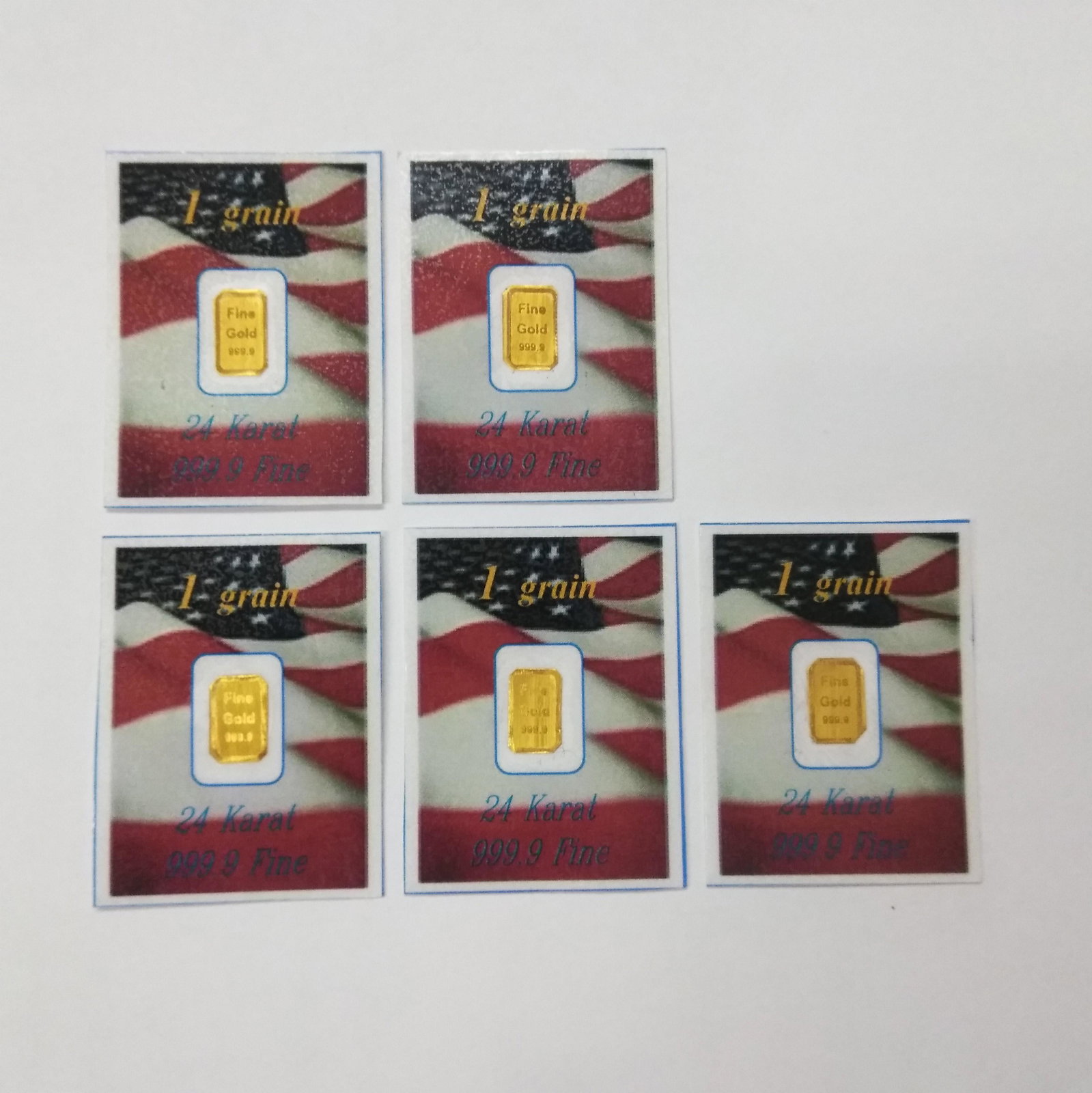 (5) 24K Gold 1 Grain, 999.9 Fine, American Flag: Five 24K Gold, 999.9 Fine Gold, 1 Grain each American Flag Background
