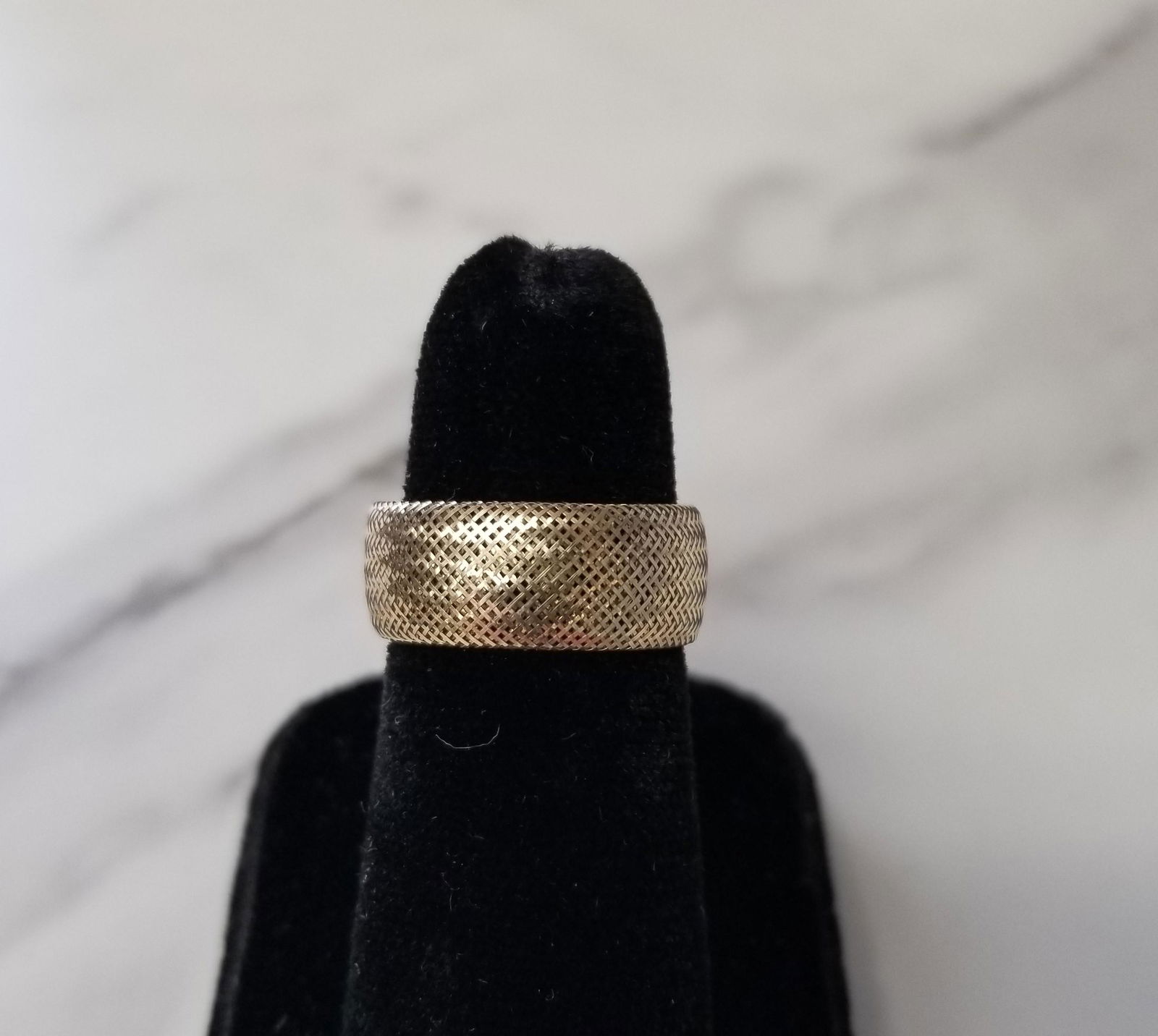10K Gold Mesh Ring: This is a pretty 10k yellow gold mesh ring. It was made in Italy. It is a size 7-9 and weighs .8 grams.