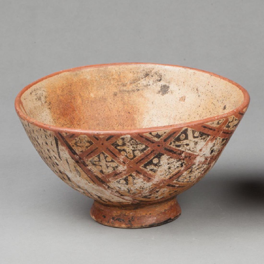 Tuncahuan Carchi cup: Polychrome terra cotta. Tuncahuan Carchi, Ecuador / Colombia, AD 500-1533. 12x9cm