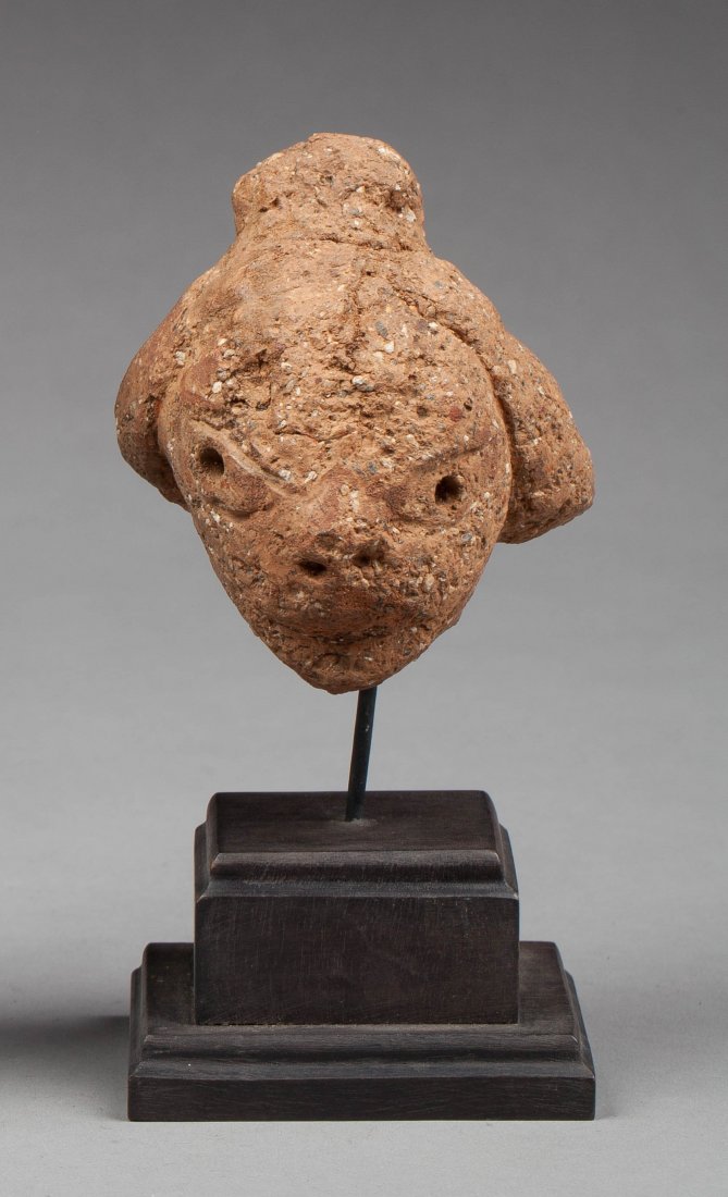 Nok feminin head: Orranged terra cota. Nok, Nigeria, 500 BC - AD 500. 8x7cm. Provenance : Ex collection jean Marc DuprÃ©.
