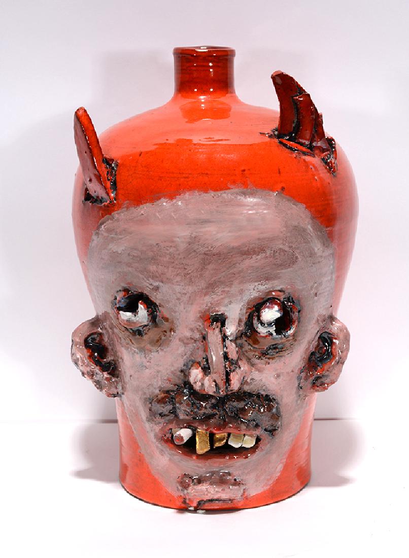 Large Fire Orange and White Devil Face Jug. (1 of 4)
