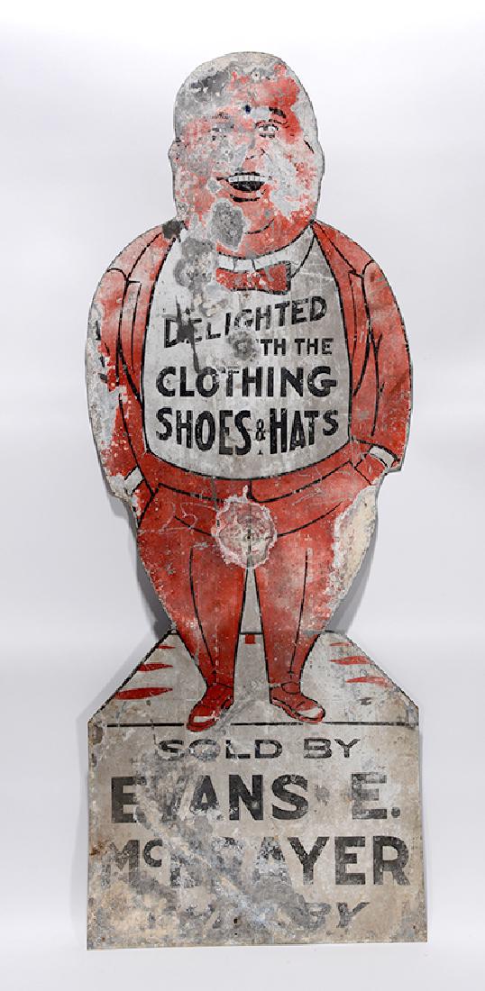 Evans C. McBrayer. Clothing Trade Sign Side.: Evans C. McBrayer. Clothing Trade Sign Side. Paint on cut out thin tin. Lots of environmental weathering, otherwise good environmental condition. 18" w x 48"h. Est. $400-800. Ship: $65