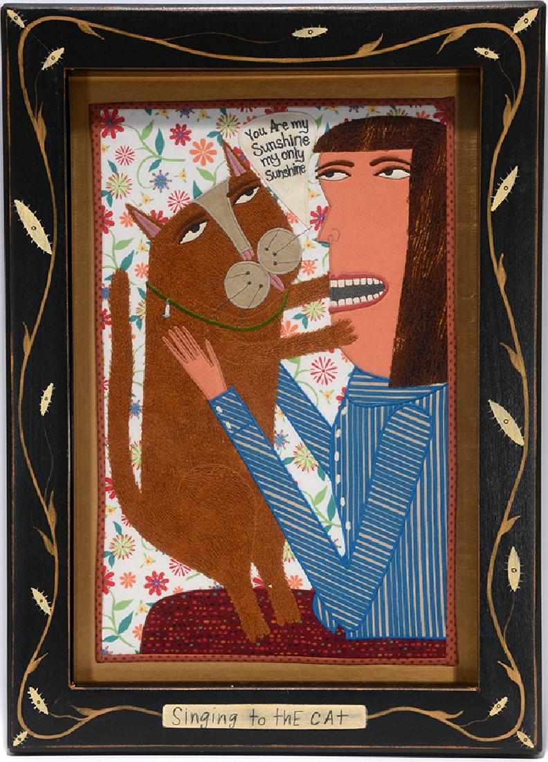 Chris Roberts Antieau. Singing To The Cat.: Chris Roberts Antieau. Singing To The Cat. Signed and titled. Appliqued fabric and mixed media with artist decorated frame. 15"w x 21"h. Excellent condition. Est. $500-800. Ship: $45