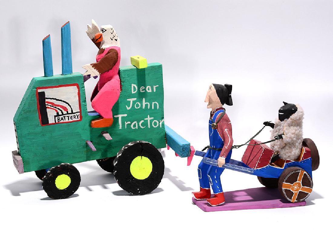 Delbert Buck. Dear John Tractor & Man Pulling Cart.: Delbert Buck. Dear John Tractor And Man Pulling Cart. 1992. Signed and dated. Carved and painted wood. Great condition. Largest is 17” x 11” x 17”. Est. $300-500. Ship: $85