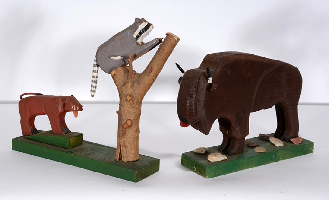 Baxter Ponder. Coon Dog & Buffalo.: Baxter Ponder. Coon Dog & Buffalo. 1993. Signed and dated. Carved and painted wood. Excellent condition. Average size is 11” x 9”. Est. $300-500. Ship: $55