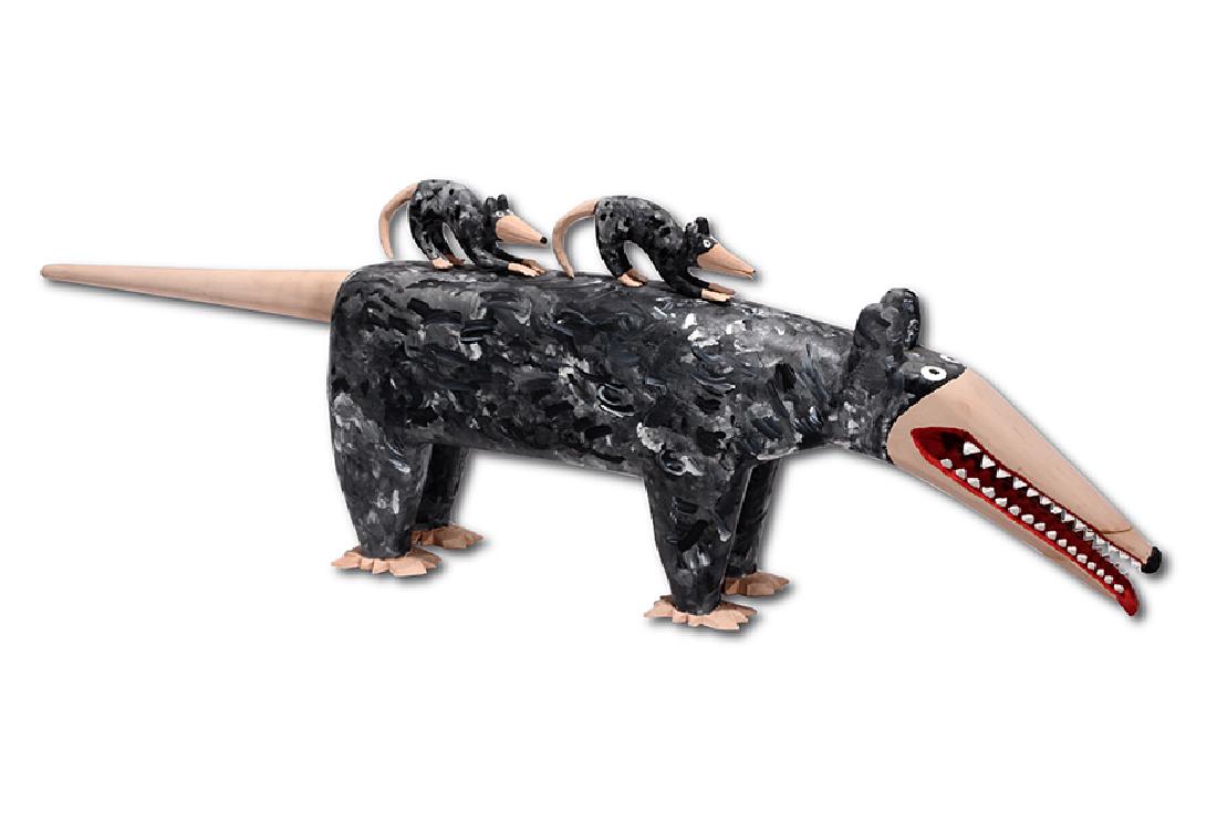 Minnie & Greg Adkins. Momma Possum and Babies.: Minnie & Greg Adkins. Momma Possum and Babies. 2001. Signed and dated. Carved and painted wood. Repair to leg, snout and two feet, otherwise good to fair condition. 42" x 10" x 5". Est. $300-600. Ship