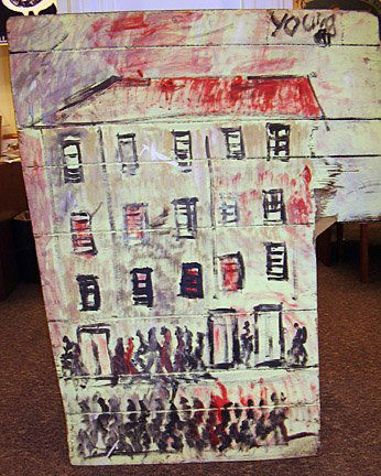 Purvis Young In the Hood: c. 1991. Miami, FL. Paint on board. 36" x 48". Irregular shape. Provenance: Acquired from Joy Moos Gallery. Donated to the AFAM courtesy of Selig and Angela Sacks. Est. $5,000-7,000. Ship: $85. This w