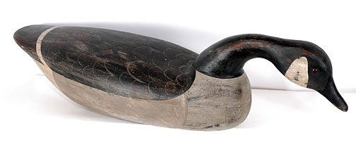 Charles Moore - Goose Decoy: Original paint. Carved and painted wood. 26.5"l x 8"w x 8.5"t. Est. $300 - $500. Ship: $30