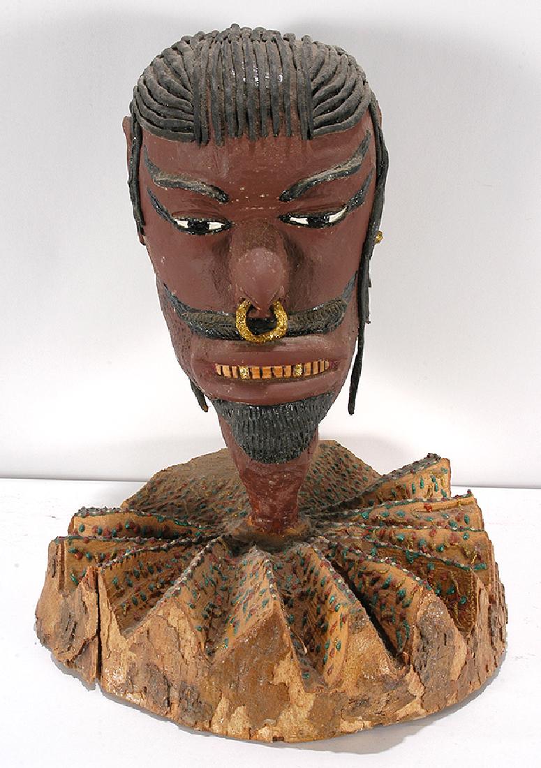 O.L. Samuels. Man's Bust. (1 of 2)