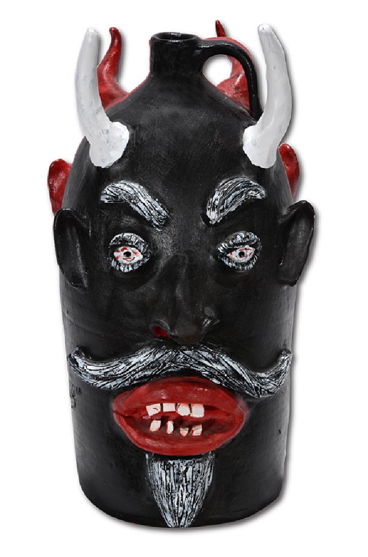 Louis & Charlie Brown. Father Son Red & Black Devil: Louis & Charlie Brown. Father and Son Double-Sided Red and Black Devil Face Jug. 1995. Signed, dated and titled and numbered, #5 of 25. Two color painted glaze. Large jug. Mint condition. 16" h.