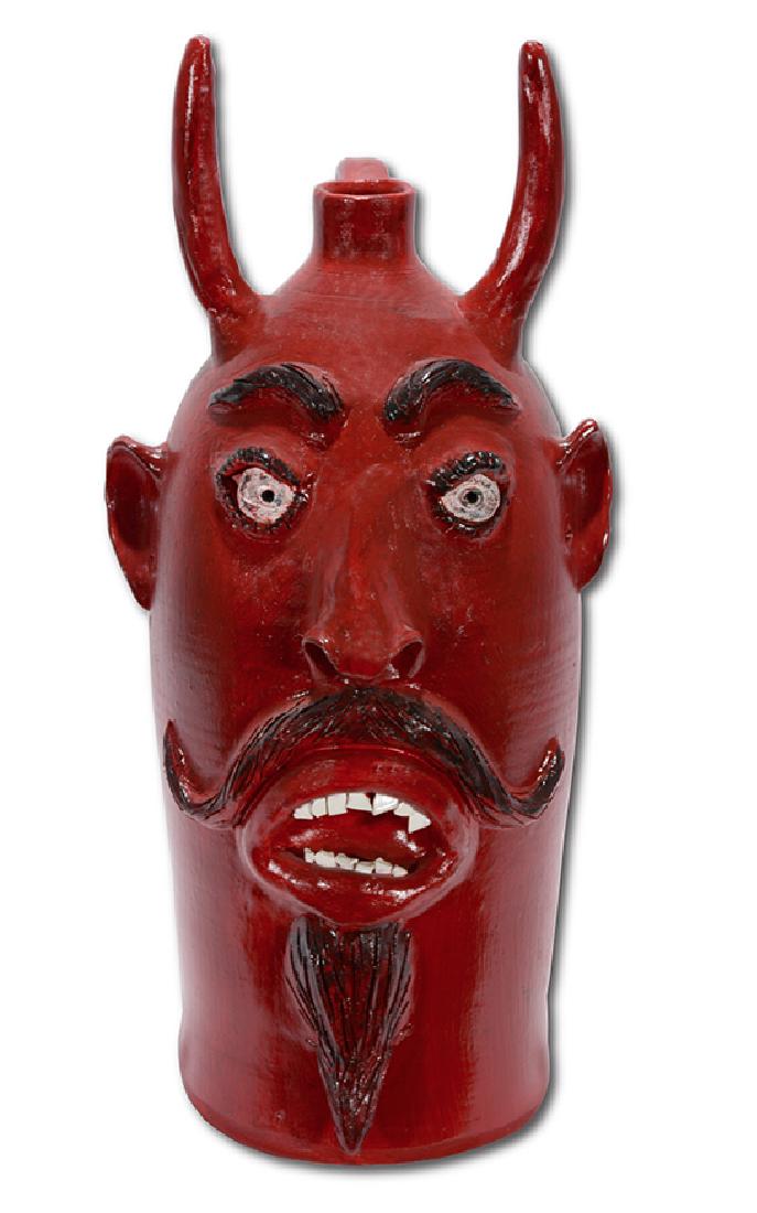 Charlie Brown. XL Five Gallon Red Devil Face Jug. (1 of 5)