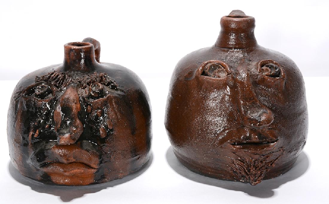 Primitive Face Jug Pair. (1 of 3)
