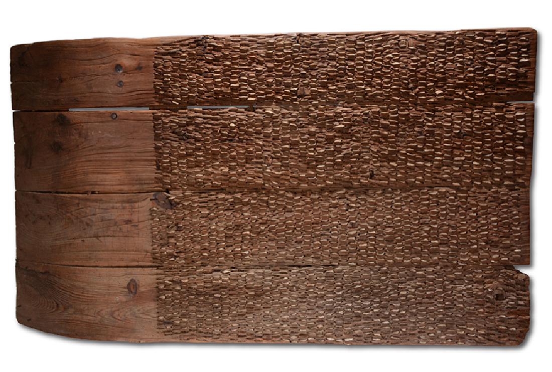 Wheat Threshing Sled.: Wheat Threshing Sled. c. 1900-1920's. Heavy boards with hundreds of sharpened flint rocks imbedded into wooden boards. Solid. Great condition. 71" w x 40" h. Est. $1,000-2,000. Buyer is re